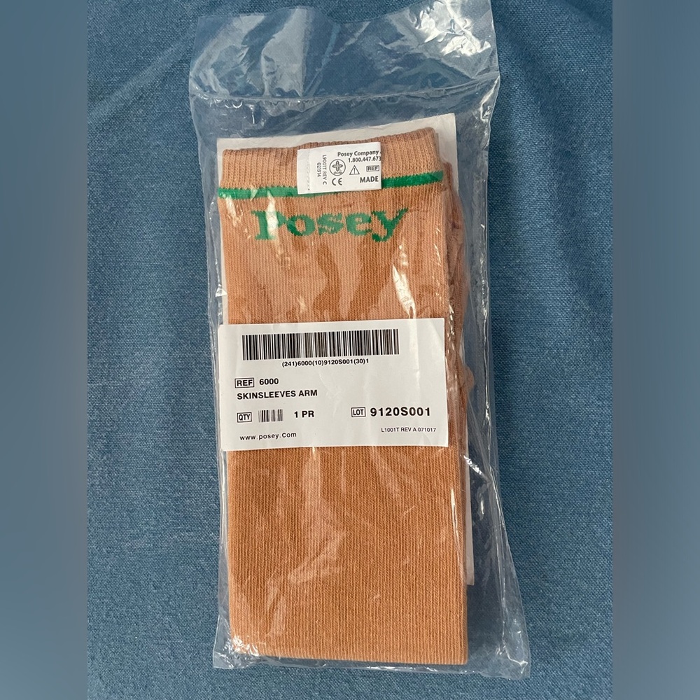 New in Bag Pair of Posey Skinsleeves for Arms, Medium Green Band